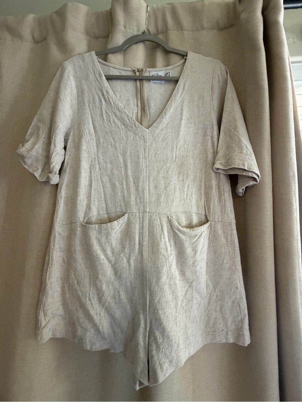 Oh Polly Cream V-Neck Short Sleeve Romper with Front Pockets